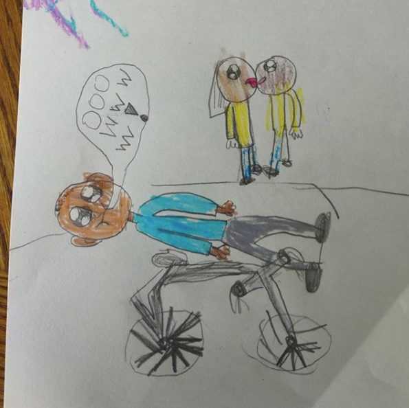 a child's drawing of me laying on the ground saying "ow" while a couple behind me smooches